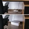 A comparison of a messy desk area with cables and a power strip, and the same area tidied up with a cable management box. Anteprima dell’immagine prodotto