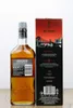 A bottle of Auchentoshan 12 Year Old Single Malt Scotch Whisky next to its gift box. Produktbild-Vorschau