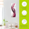 A wall clock with a modern abstract design is displayed on a white wall, with kitchen items visible on a shelf below. To the right, a green panel highlights product features with icons and text. Produktbild-Vorschau
