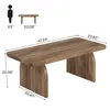 A product image showing a wooden coffee table with dimensions and a scale figure. Anteprima dell’immagine prodotto