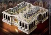 A detailed, ornate chess set with figures from The Lord of the Rings, displayed on a wooden surface with artwork in the background. Podgląd zdjęcia produktu