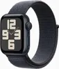 A close-up studio shot of a smartwatch with a dark blue case and a dark gray woven band, displayed against a white background. Voir les images du produit