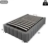 A grey upholstered bed frame with a slatted base, shown with dimensions indicated. Produktbild-Vorschau