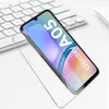 A smartphone screen protector is shown on top of a smartphone, which is placed on a keyboard. Produktbild-Vorschau