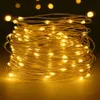 A coiled string of yellow LED lights against a dark background. Produktbild-Vorschau