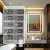 A modern bathroom with a lit LED mirror displaying various features. Anteprima dell’immagine prodotto