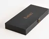 A closed black wooden box with the brand name 'Beliani' embossed in gold on the lid, and a gold clasp on the right side. Náhled obrázku produktu