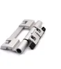 A silver-colored hinge is shown against a white background. Produktbild-Vorschau