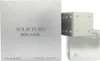 A perfume bottle and its packaging are shown. Náhľad obrázku produktu