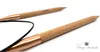 Two circular knitting needles made of wood with copper connectors are shown on a white background. Produktbild-Vorschau