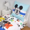 A Disney Mickey Mouse themed bedding set on a bed. Produktbild-Vorschau