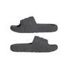 A pair of gray Adidas Adilette 22 slides shown from a side view against a white background. Podgląd zdjęcia produktu