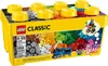 A Lego Classic brick box filled with colorful Lego bricks, with a small Lego train and a flower model on the front. Produktbild-Vorschau