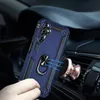 A blue phone case with a ring holder is magnetically attached to a car vent mount. Produktbild-Vorschau