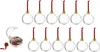 A set of 12 clear, fillable Christmas ornaments with red hanging ribbons and gold caps, arranged in two rows. One open ornament is shown in the lower-left corner, revealing a small photo inside. Náhľad obrázku produktu