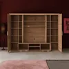 An empty wooden media console and shelving unit against a dark red wall. Produktbild-Vorschau