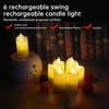 A collection of rechargeable LED candles arranged on a surface in front of a bookshelf. Produktbild-Vorschau