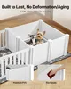 Two small dogs are inside a white plastic dog kennel. The kennel is set up on a wooden floor with a patterned mat underneath. There are text overlays describing the product's features. Podgląd zdjęcia produktu