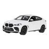 A white BMW X6 M toy car is shown from a side-angle against a white background. Podgląd zdjęcia produktu
