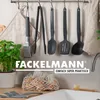Kitchen utensils hanging on a rack above a countertop with a sink and a plant. Produktbild-Vorschau