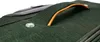 A close-up view of a green suitcase handle and a clear button. Náhled obrázku produktu