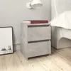 A bedside table with a book on top, next to a bed and a framed picture. Produktbild-Vorschau