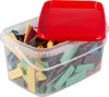 A clear plastic bucket filled with colorful wooden glazing blocks, with a red lid placed on top. Produktbild-Vorschau