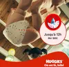 A baby's legs and diaper are shown from a low angle, with a marketing graphic overlay. Náhľad obrázku produktu