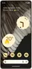 A smartphone screen displaying widgets and app icons. Náhľad obrázku produktu