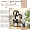 A modern black geometric S-shaped bookshelf filled with decorative items and books, set against a light background with a plant on the side. Podgląd zdjęcia produktu