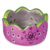 A pink ceramic pot with green trim and black flower and heart decorations. Produktbild-Vorschau