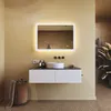 A modern bathroom vanity with a backlit mirror, sink, and storage. Náhled obrázku produktu