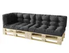 A dark gray pallet sofa with cushions, shown from a side-angle against a white background. Náhľad obrázku produktu