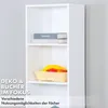 A white bookshelf with books and fruit on display. Produktbild-Vorschau