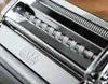 Close-up of a chrome pasta maker. Náhled obrázku produktu