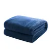 A folded blue blanket on a white background. Produktbild-Vorschau