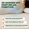 A person sleeping on a white mattress topper with blue wavy lines indicating airflow or comfort features. Produktbild-Vorschau