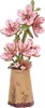 A 3D wooden puzzle of pink flowers in a vase. Náhľad obrázku produktu