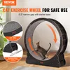 A cat is running on a large exercise wheel in a room. Náhľad obrázku produktu
