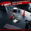 A miniature remote-controlled drift car is shown on a dark surface, navigating around traffic cones. The scene is set up to simulate a race or obstacle course. Náhled obrázku produktu
