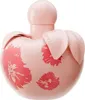 A pink apple-shaped perfume bottle with pink floral designs and the brand name 'Nina Ricci' visible. Anteprima dell’immagine prodotto