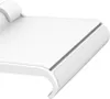 A close-up view of a white electronic accessory, likely a phone stand, showing its curved edge and a recessed area. Náhľad obrázku produktu