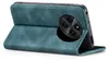 A teal flip cover case for a smartphone is shown open, revealing the phone's camera module. Produktbild-Vorschau