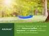 A blue swing hanging in a sunny outdoor setting with green grass and trees. Anteprima dell’immagine prodotto