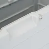 Close-up view of the edge and interior of a light gray storage box. Anteprima dell’immagine prodotto