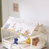 A child's bed with a tent-like canopy featuring cartoon cats and stars. Several stuffed animals are on the bed. Anteprima dell’immagine prodotto