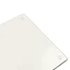 A close-up view of the corner of a clear glass cutting board. Podgląd zdjęcia produktu