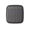 A battery charger with multiple slots for batteries. Produktbild-Vorschau
