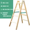 A wooden stepladder with text overlays describing its features. Produktbild-Vorschau