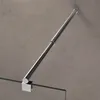 A close-up view of a shower support rod attached to a glass shower door. Voir les images du produit